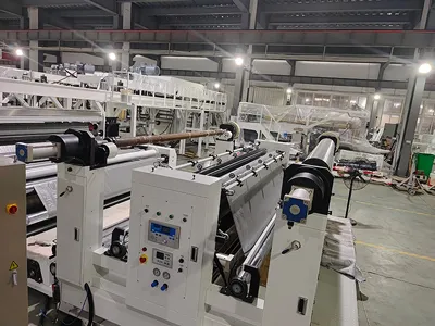 Machine de complexage pour bâches