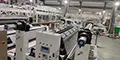 Machine de complexage pour bâches