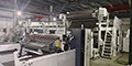 Machine de complexage pour bâches