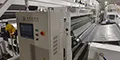 Machine de complexage pour bâches